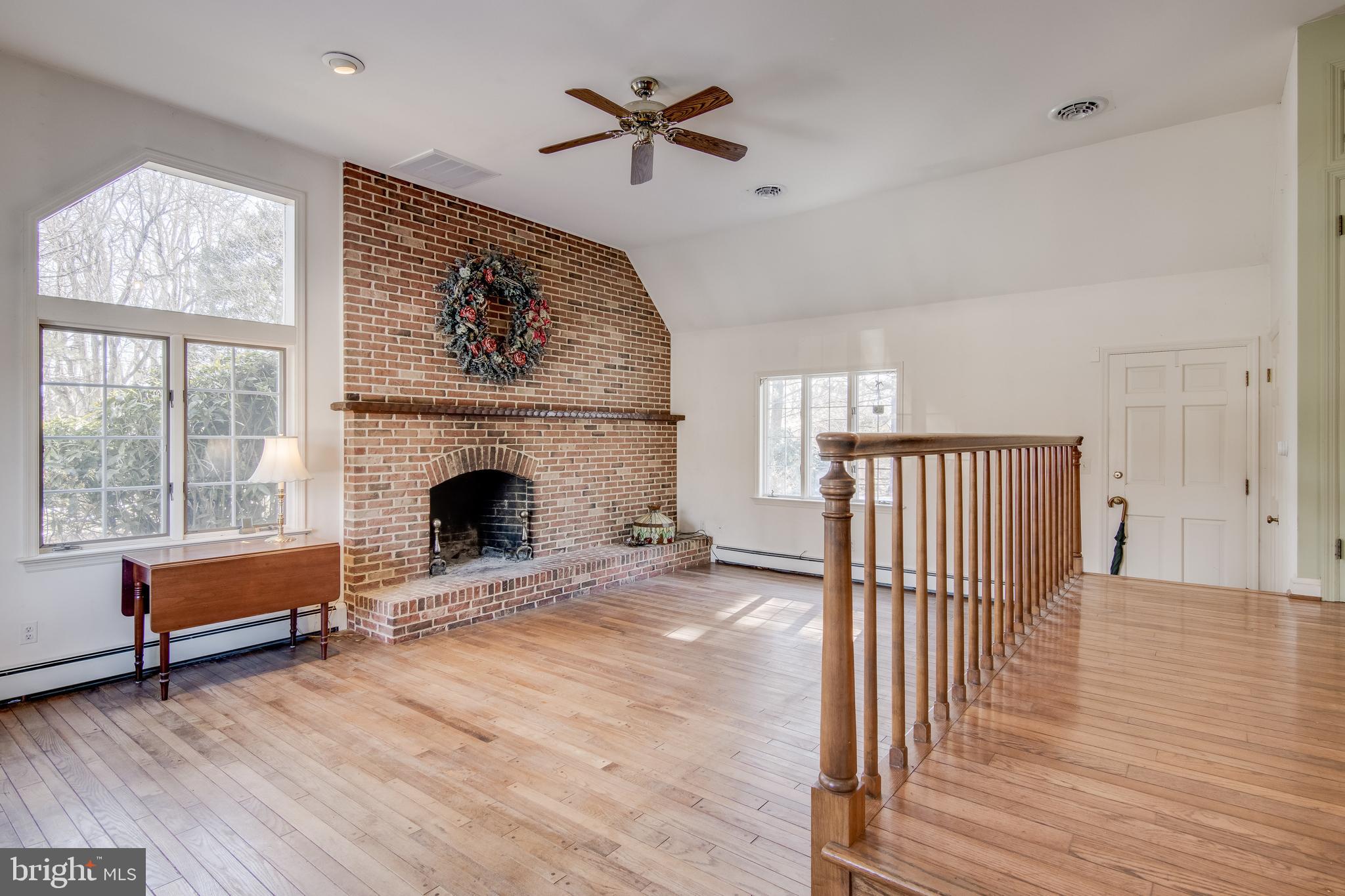 121 West Ring Factory Road Bel Air, MD 21014 - Photo 4 of 46 Family room with vaulted ceiling and fireplace.