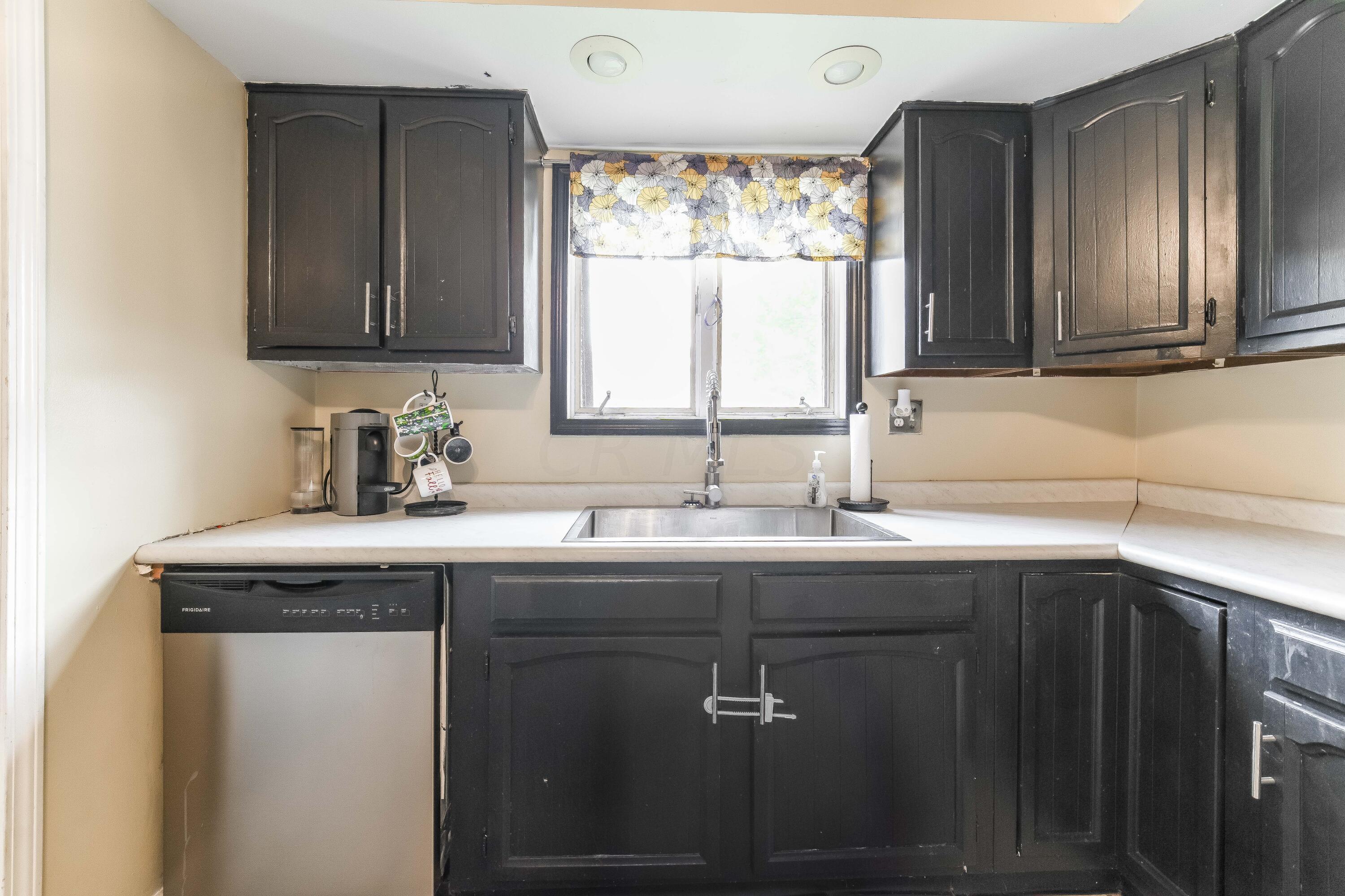 21584 Main Street Raymond, OH 43067 - Photo 10 of 40 Big stainless steel sink w/ window view