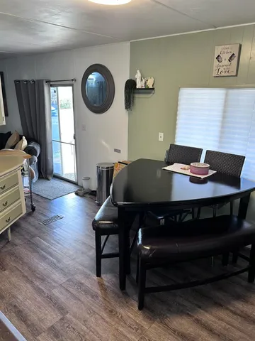 a workspace with furniture and window