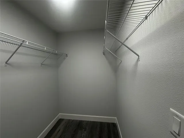 a view of a room with racks on the wall