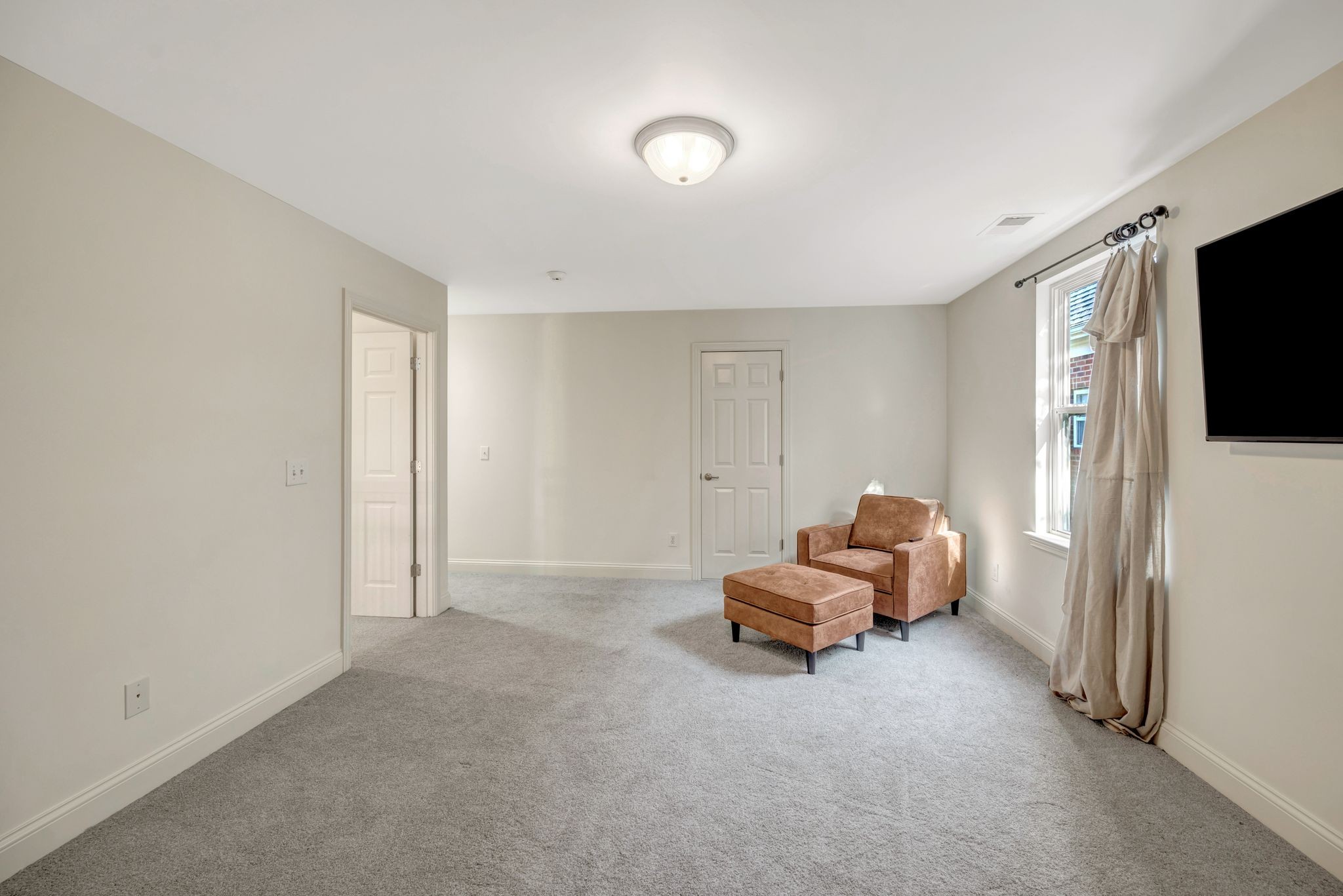 300 Addison Avenue Franklin, TN 37064 - Photo 19 of 35 a living room with furniture and a flat screen tv