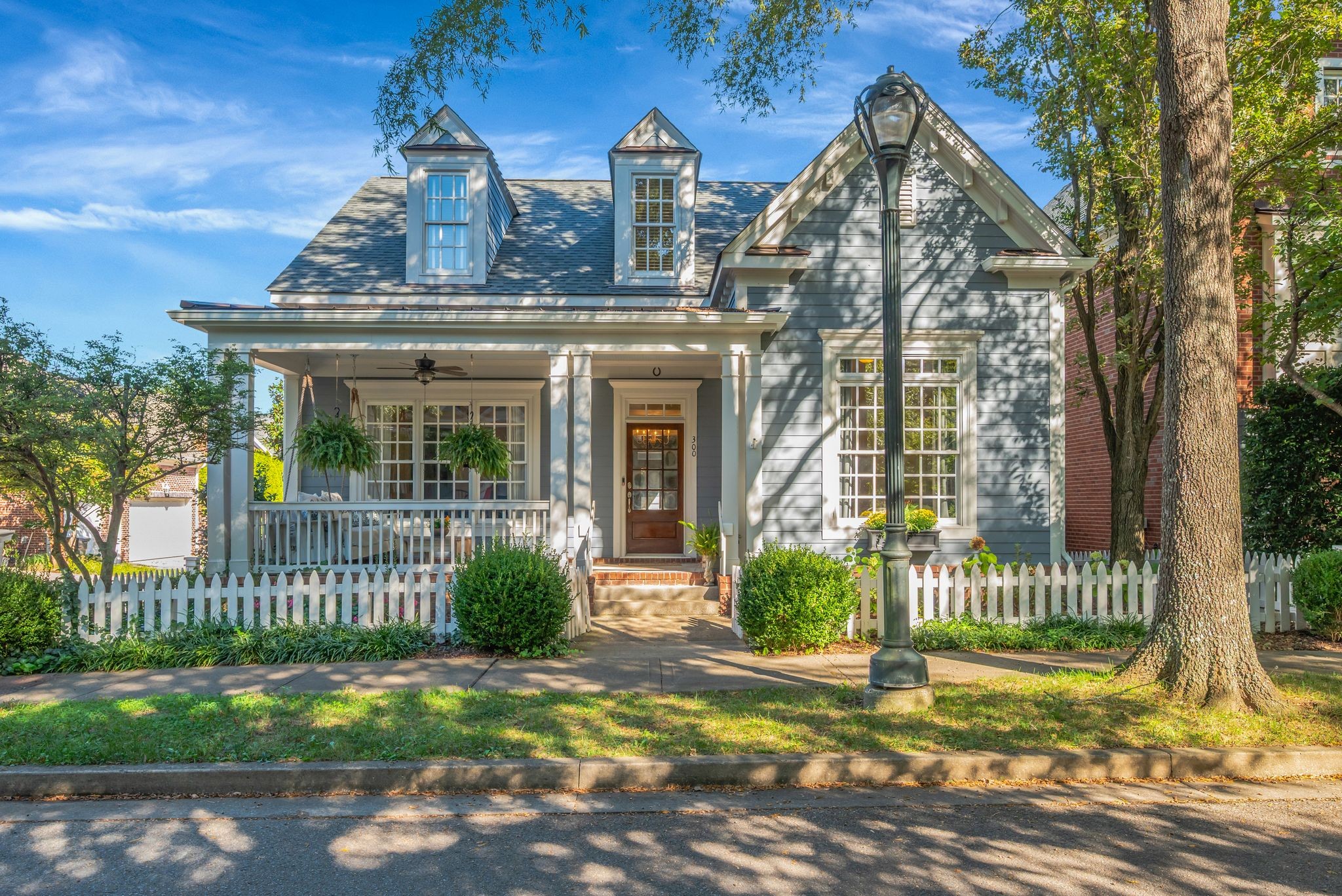 300 Addison Avenue Franklin, TN 37064 - Photo 2 of 35 a view of a house with a small yard and plants