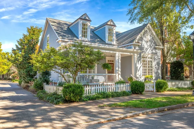 a view of a living room and balcony