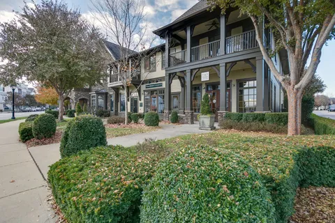 a view of a street with houses