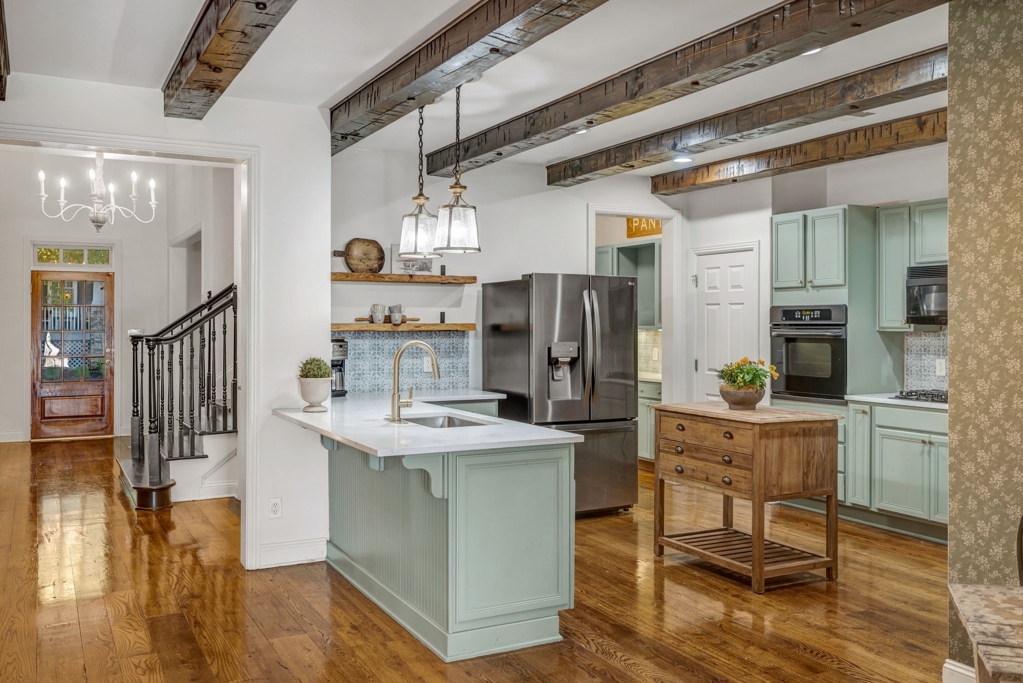 300 Addison Avenue Franklin, TN 37064 - Photo 10 of 35 a kitchen with refrigerator and cabinets