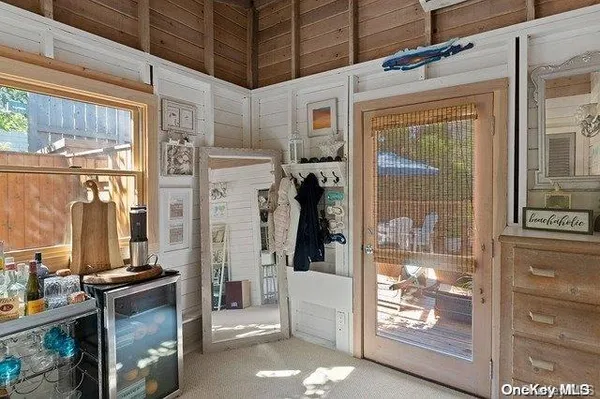 a view of a living room with a large window