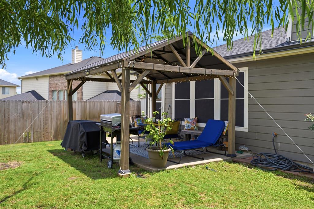 1213 Hampton Drive Forney, TX 75126 - Photo 21 of 27 a patio with table and chairs