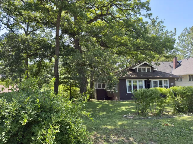 a house view with a outdoor space