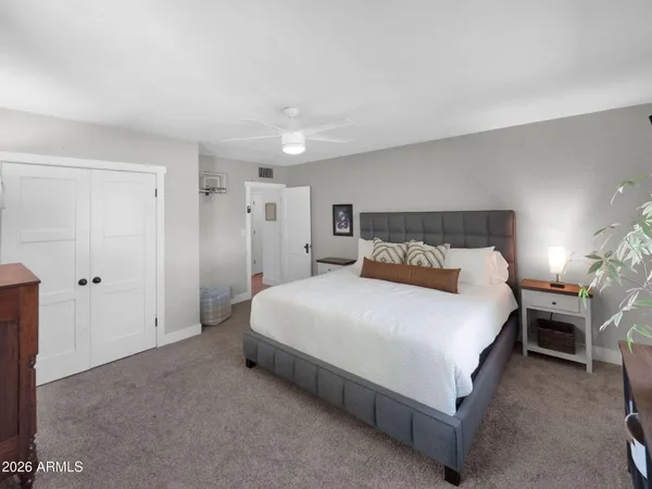 a view of a swimming pool and lounge chair