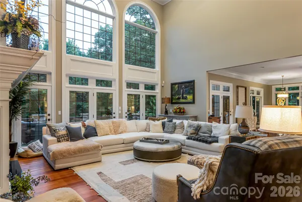 a kitchen with stainless steel appliances granite countertop wooden cabinets and a stove top oven