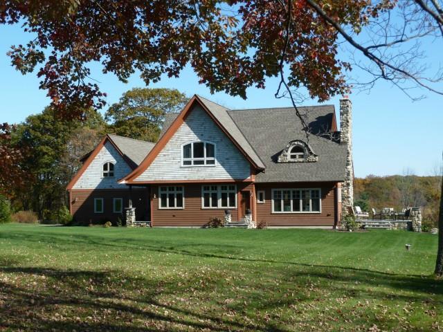 40 Shearer Road Washington, CT 06793 - Photo 1 of 1 a view of a white house with a big yard and large trees