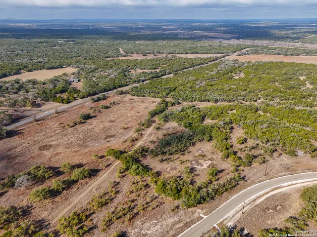 a view of a yard with an outdoor space