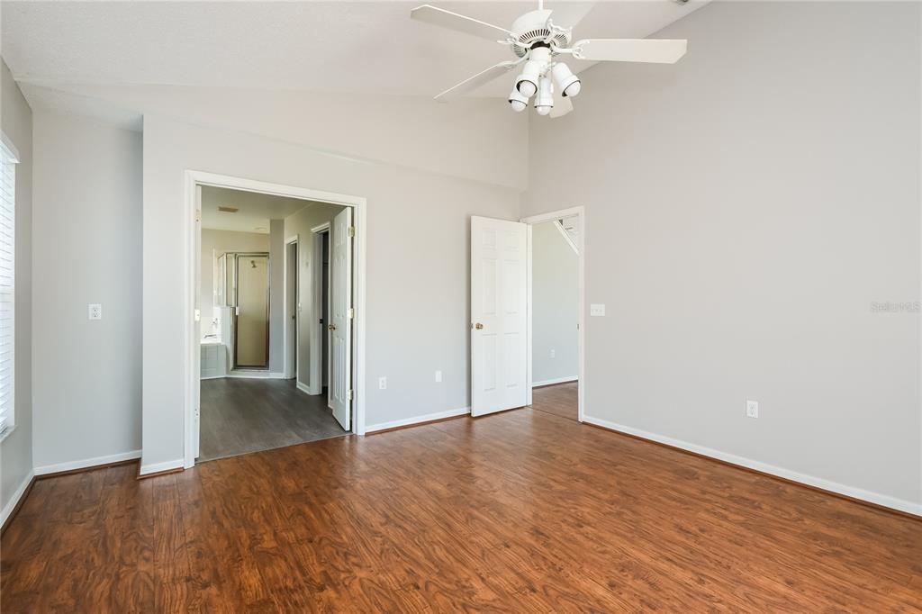 1170 Creekview Court St. Cloud, FL 34772 - Photo 10 of 17 a view of empty room with wooden floor