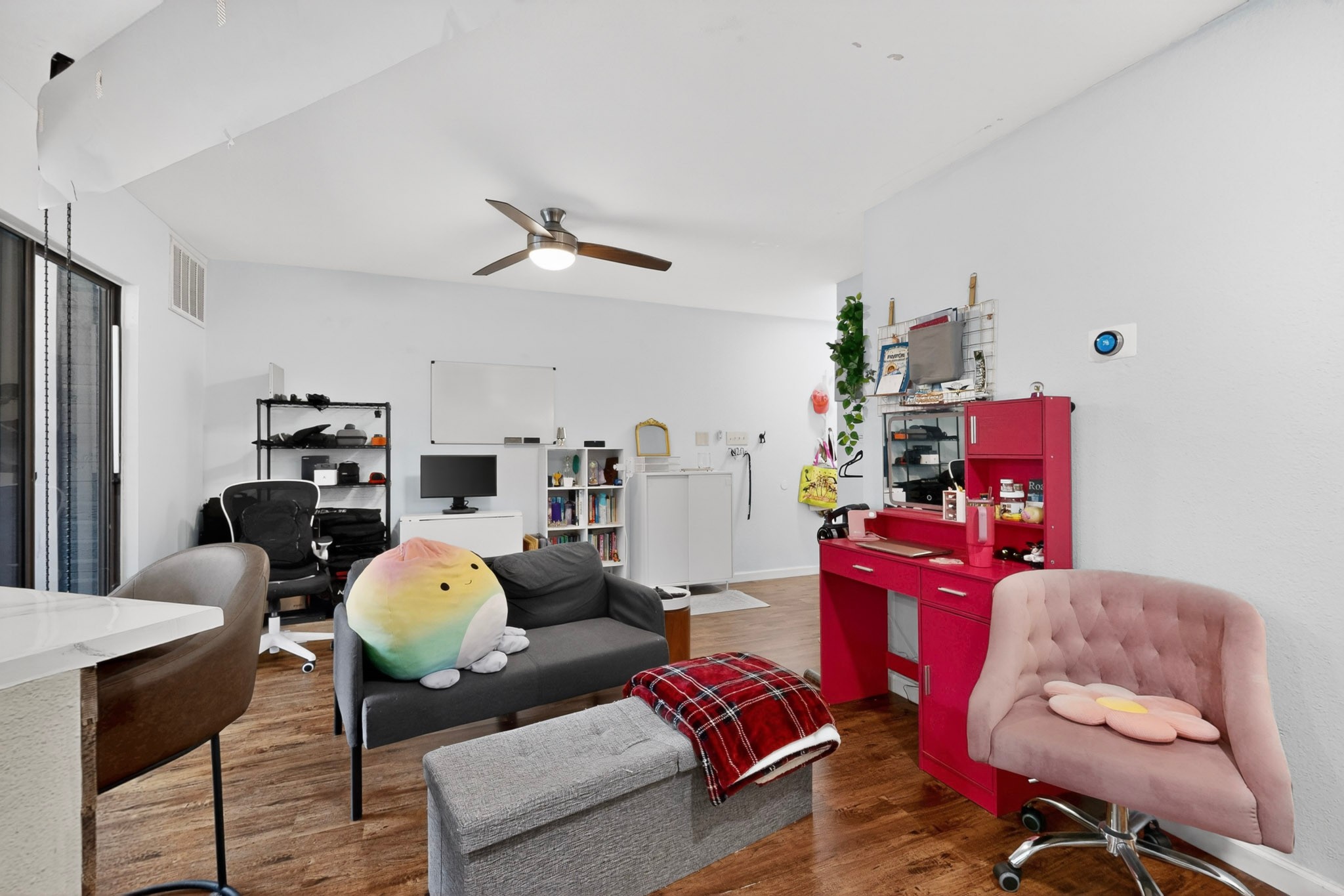 2500 Burleson Road, Unit 506 Austin, TX 78741 - Photo 8 of 23 a living room with furniture and wooden floor