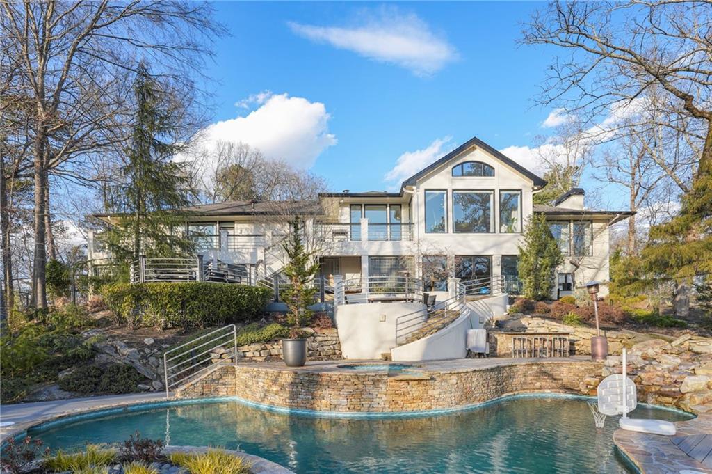 a view of a house with swimming pool