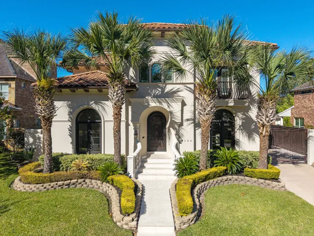 a view of a house with a swimming pool