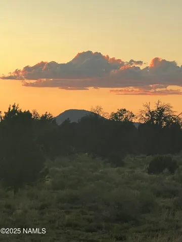 a view of lake with mountain