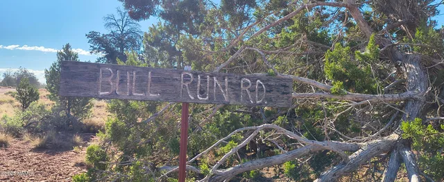 a view of a street with an ocean view