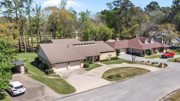 an aerial view of a house with garden