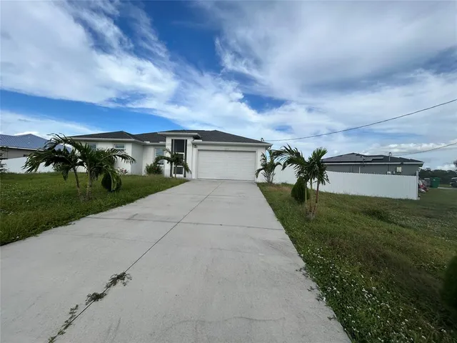 a view of a terrace with yard