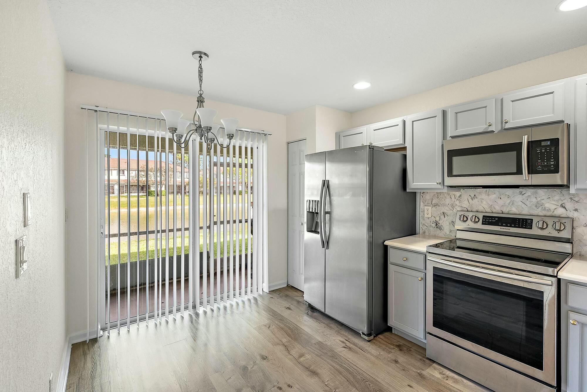 6606 Sandy Bank Terrace Riviera Beach, FL 33407 - Photo 7 of 26 tempImageT5isEv