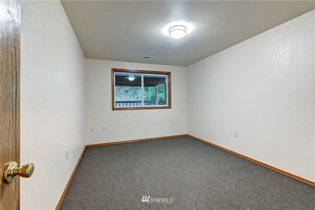 15220 OK Mill Road Snohomish, WA 98290 - Photo 15 of 26 an empty room with a window
