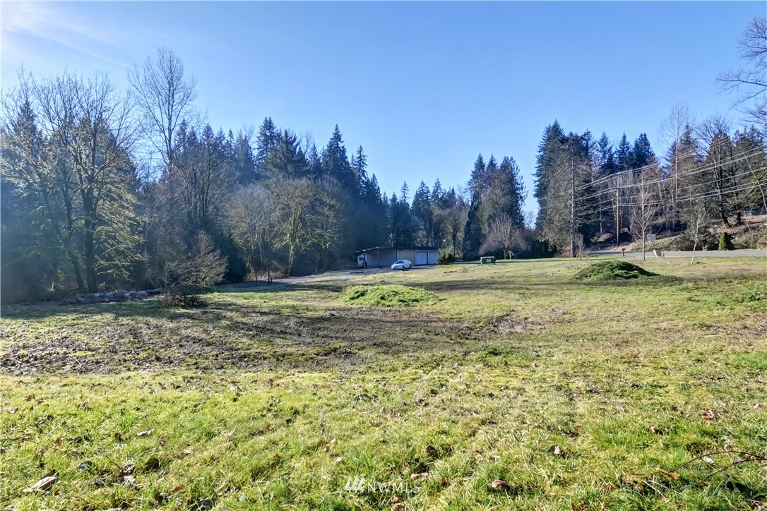 15220 OK Mill Road Snohomish, WA 98290 - Photo 26 of 26 a view of a yard with a house in the background