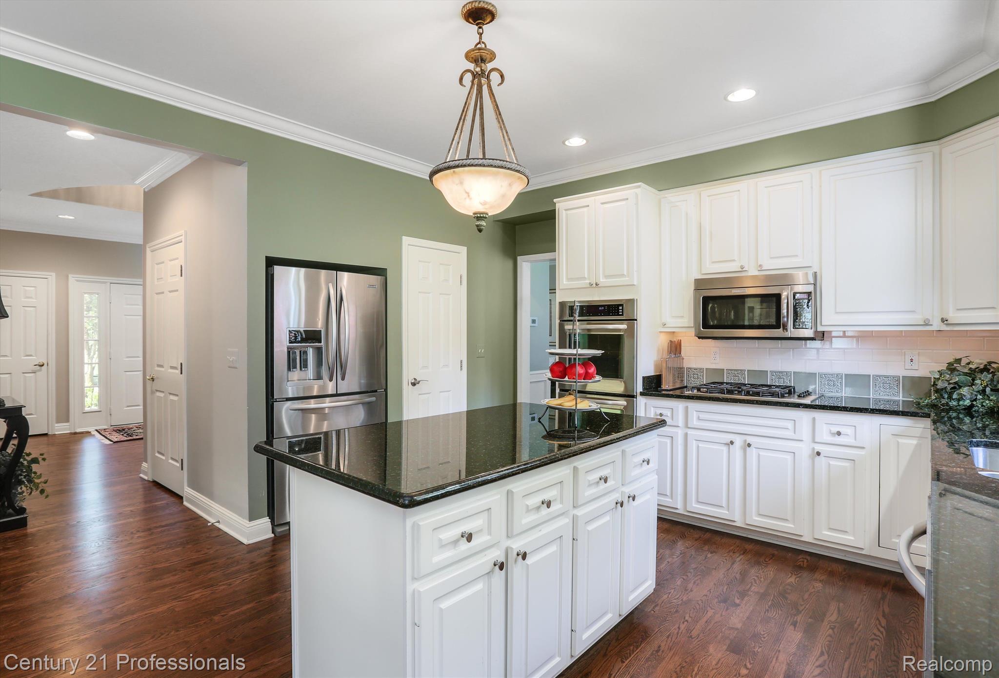 2104 Mapleridge Road Rochester, MI 48309 - Photo 18 of 65 Walk in pantry is accessible next to the fridge
