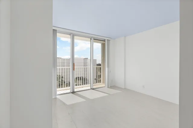 a view of an empty room and window