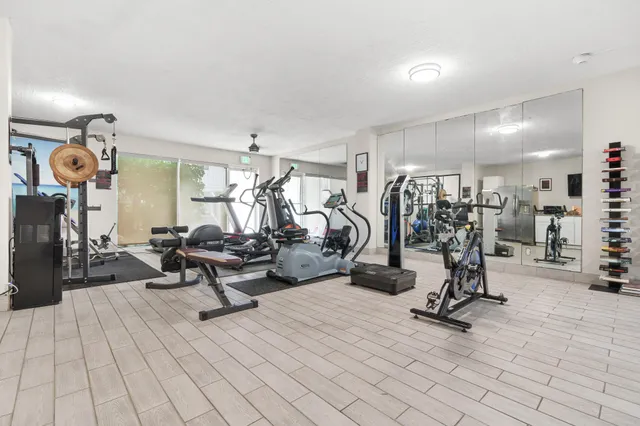 a view of a swimming pool outdoor seating and a yard