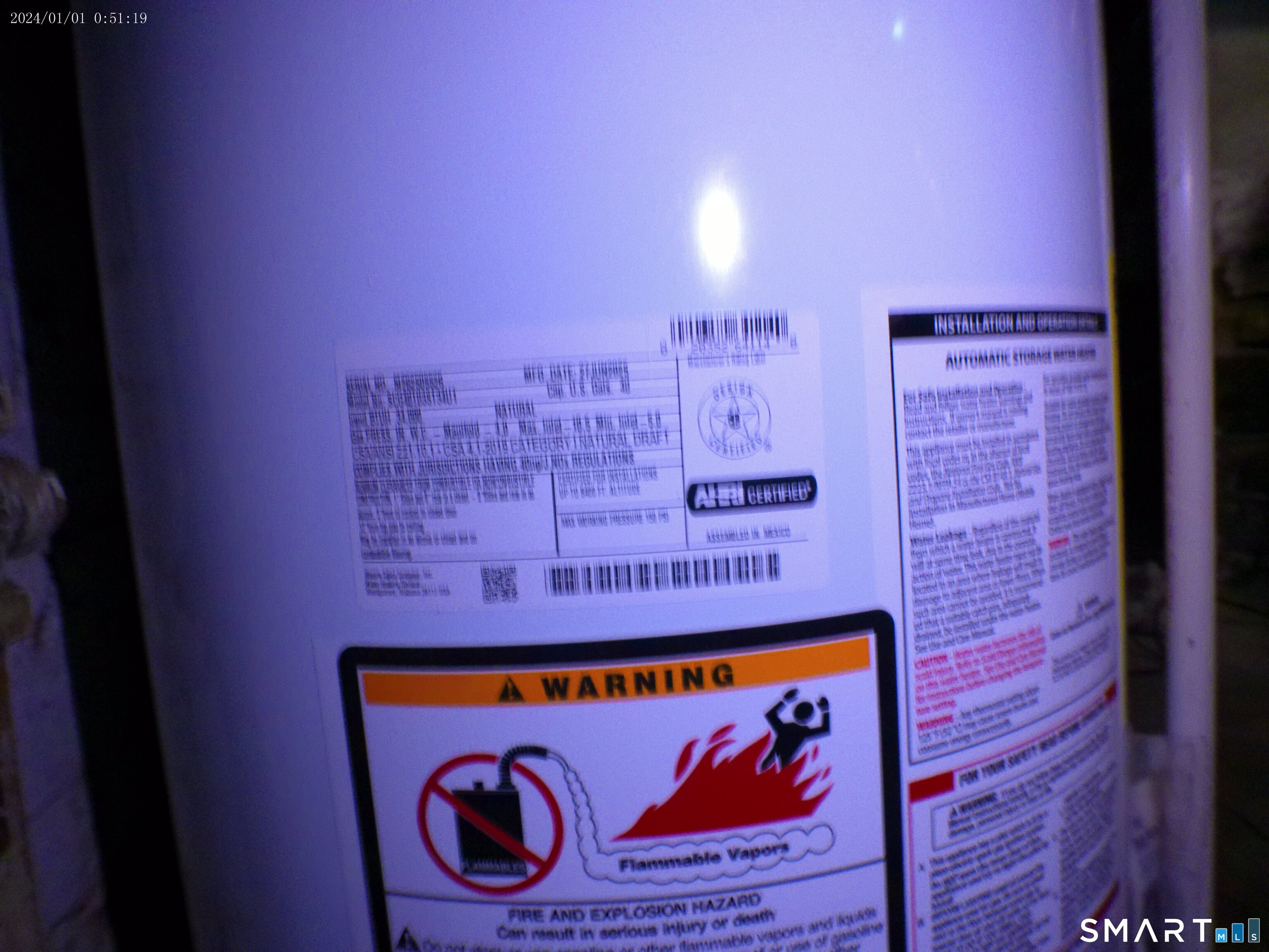 306 Carroll Avenue Bridgeport, CT 06607 - Photo 3 of 15 a sign that is on the wall of building