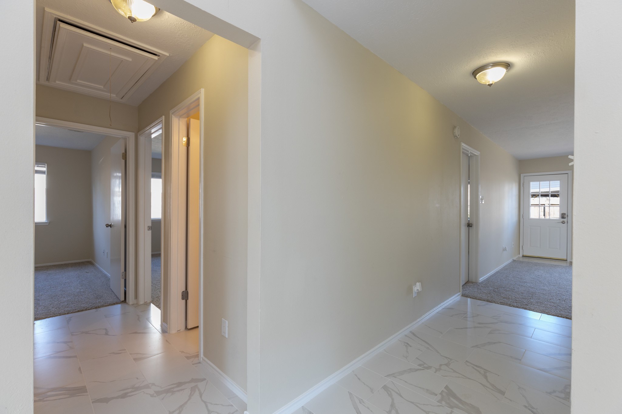 3422 Keygate Drive Spring, TX 77388 - Photo 14 of 32 a view of a hallway with wooden floor