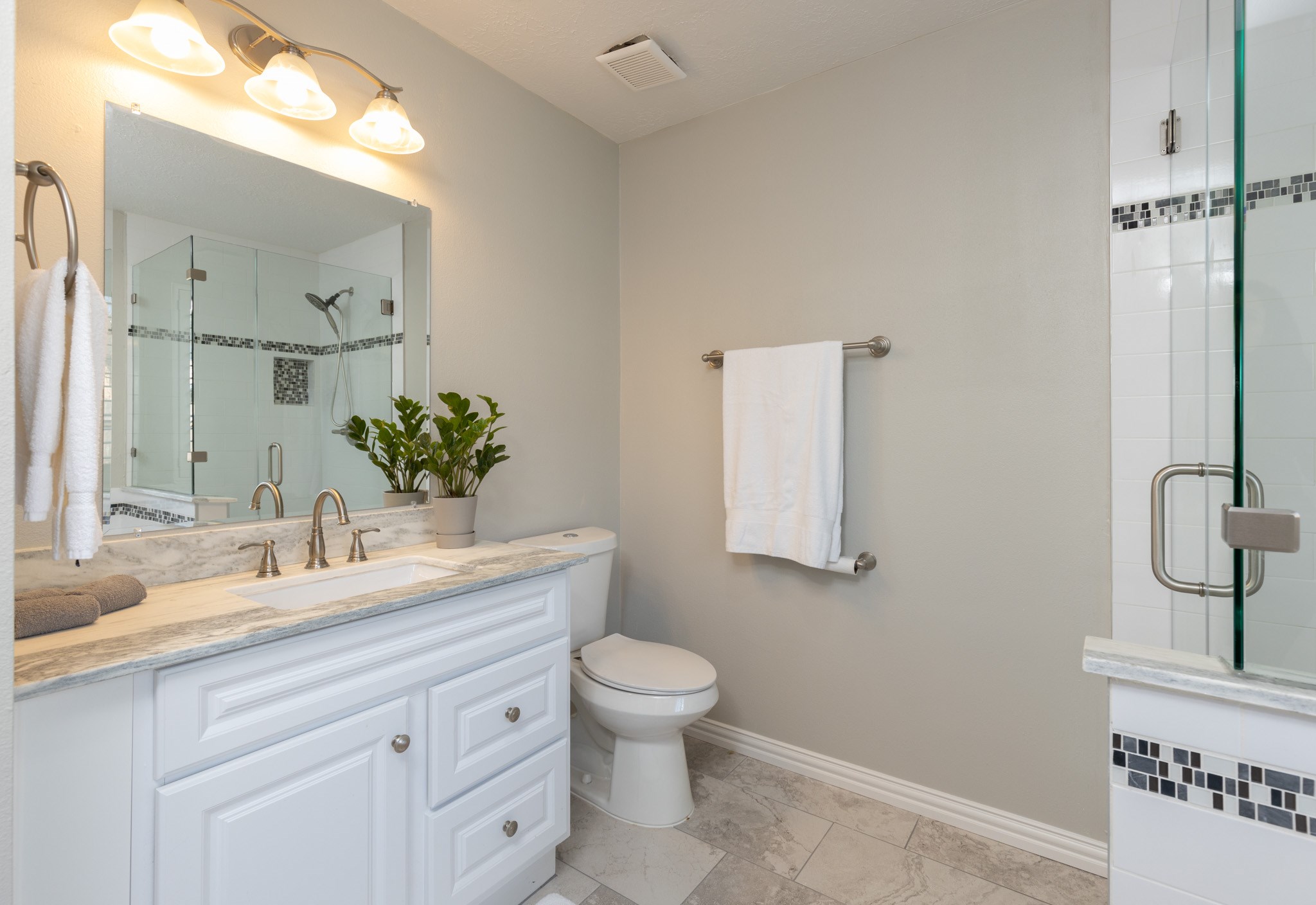 3422 Keygate Drive Spring, TX 77388 - Photo 16 of 32 a bathroom with a granite countertop sink a toilet and mirror