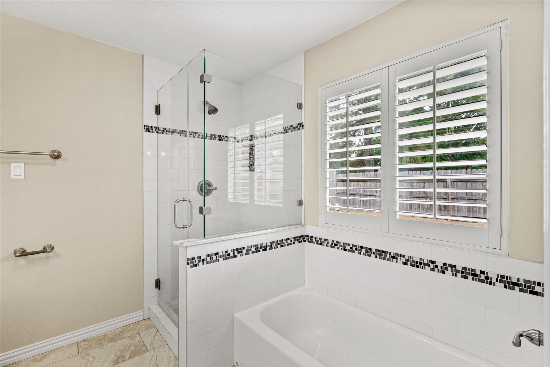 3422 Keygate Drive Spring, TX 77388 - Photo 17 of 32 a bathroom with a tub and a window