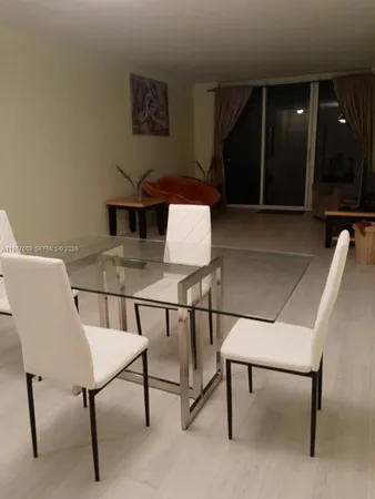 a workspace with furniture and window