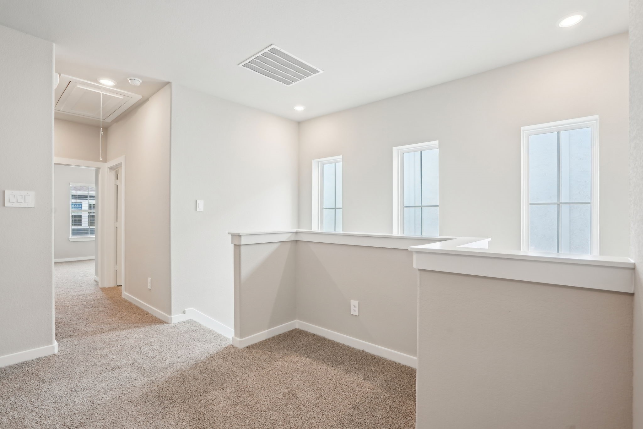3119 Quiet Sunset Drive Houston, TX 77080 - Photo 17 of 46 wooden floor in an empty room with a window