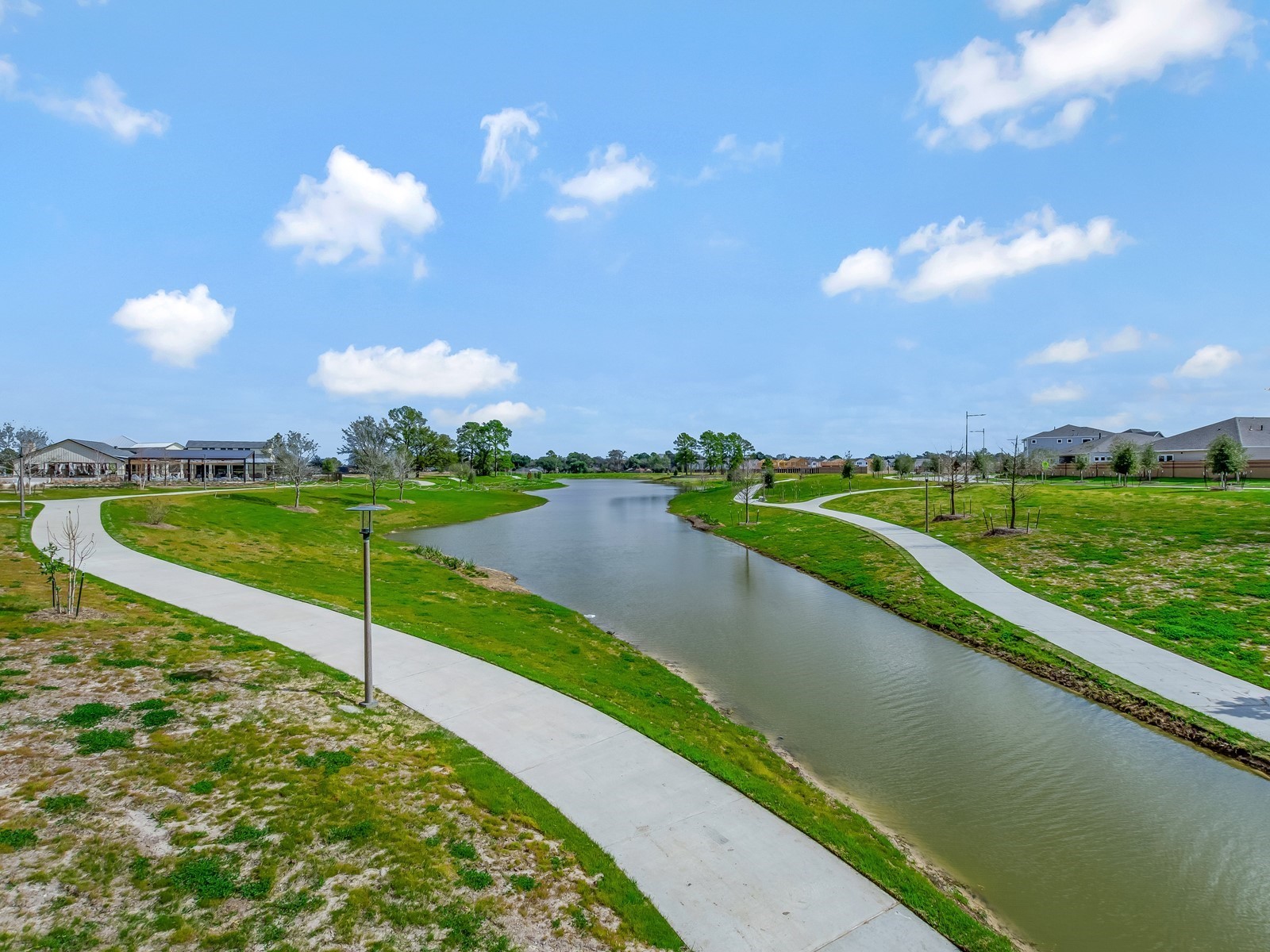 3119 Quiet Sunset Drive Houston, TX 77080 - Photo 44 of 46 a view of a lake with houses in the back