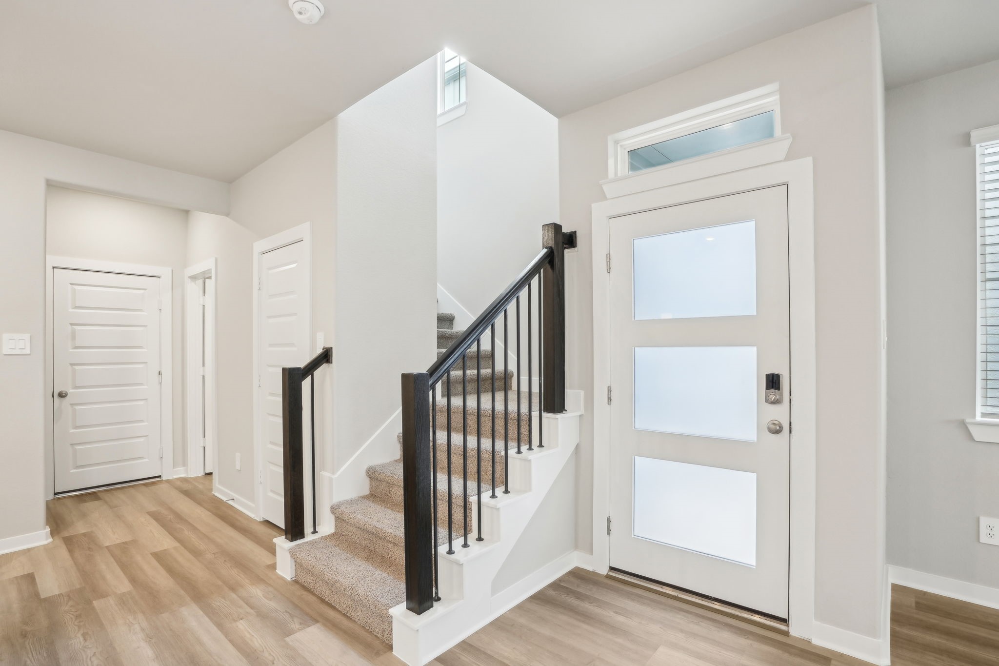 3119 Quiet Sunset Drive Houston, TX 77080 - Photo 6 of 46 a view of a hallway with staircase