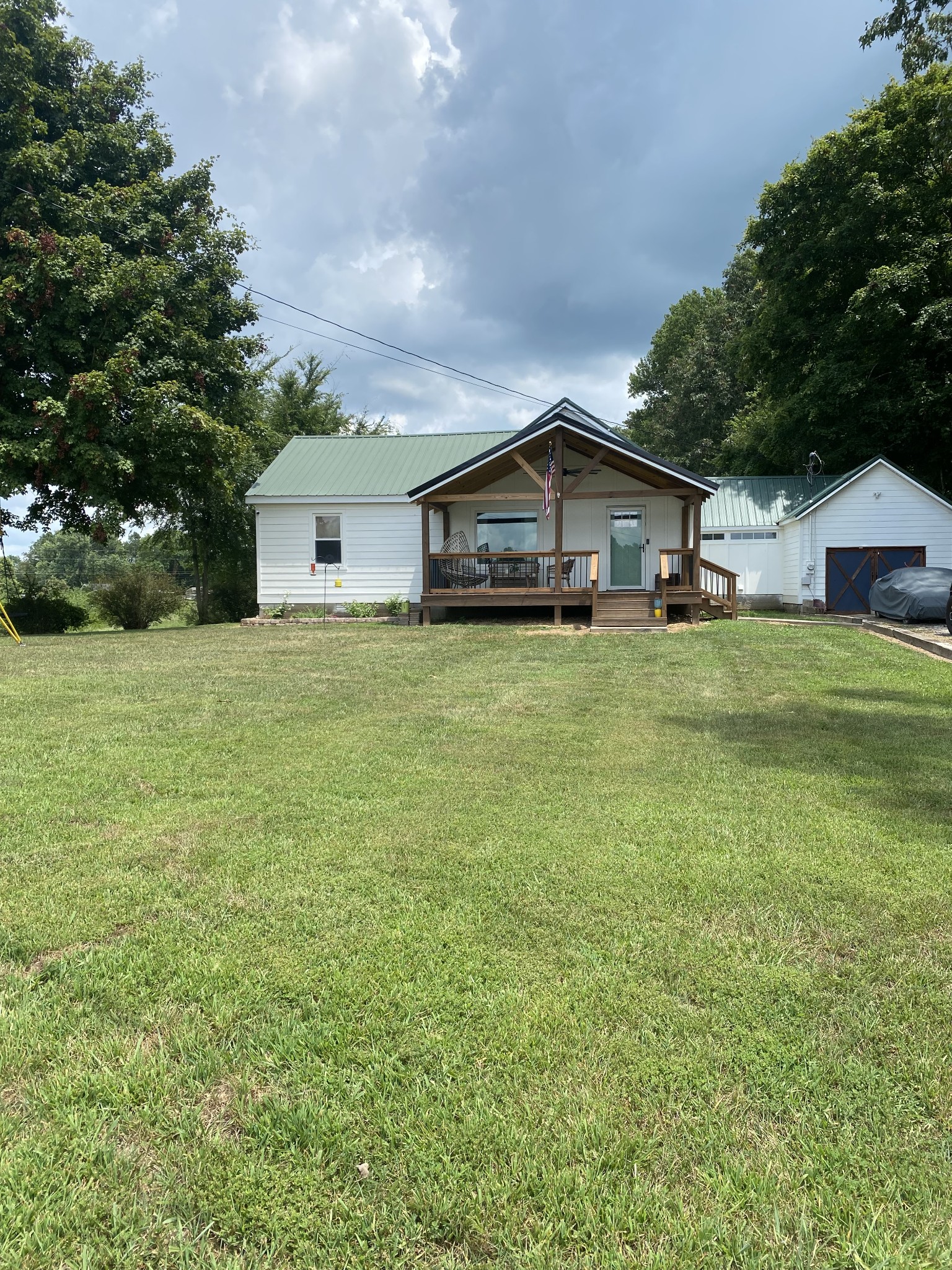 2019 Pinnacle Road Pleasant View, TN 37146 - Photo 3 of 24 a big house with a big yard and large trees