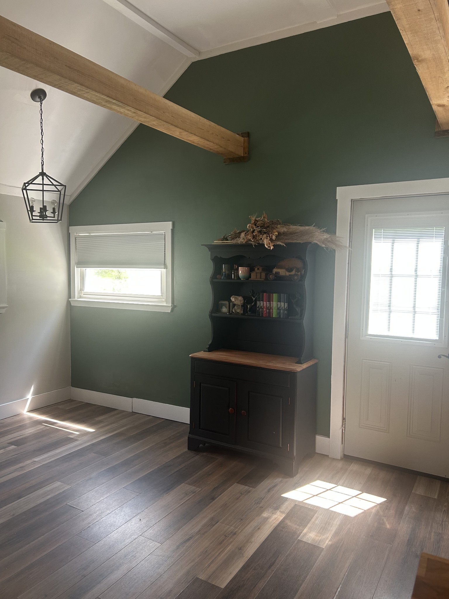 2019 Pinnacle Road Pleasant View, TN 37146 - Photo 9 of 24 a view of an empty room with wooden floor and a window