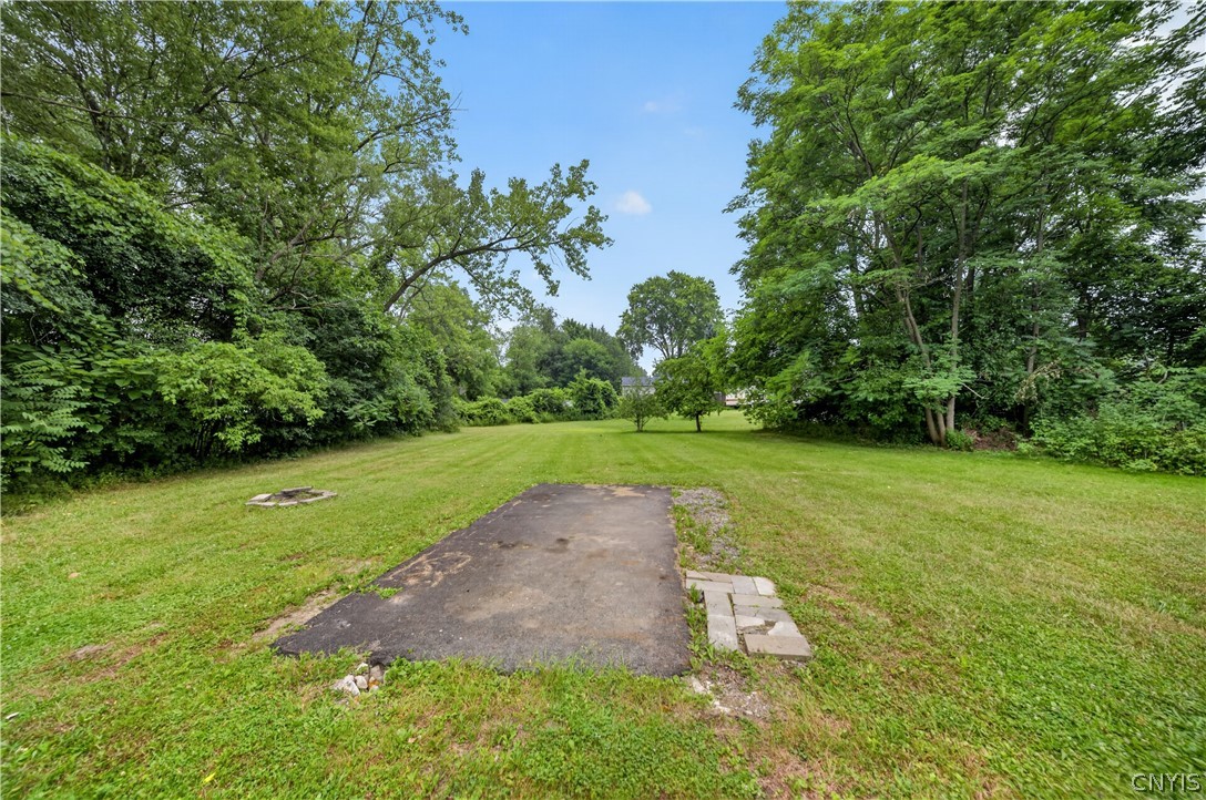5506 Bear Road Clay, NY 13212 - Photo 28 of 36 The large lot is sprawling, with plenty of lush gr