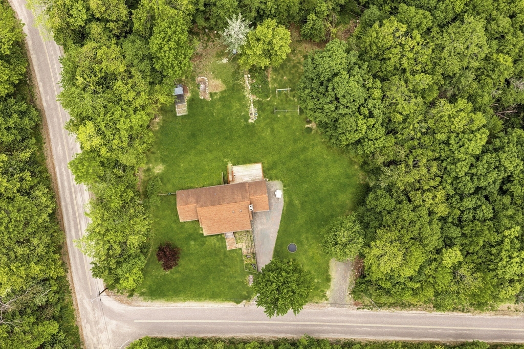22 Lyon Hill Road Chester, MA 01011 - Photo 4 of 38 an aerial view of a house with a yard