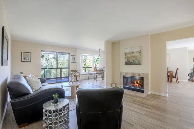 a kitchen with cabinets appliances a sink and a window