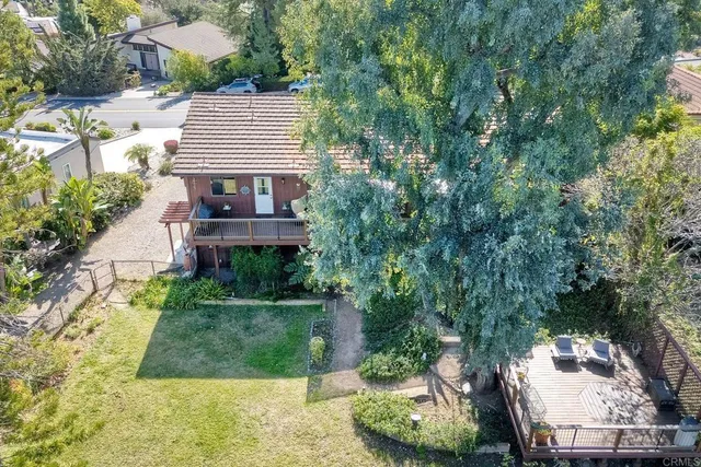 a view of a balcony with furniture