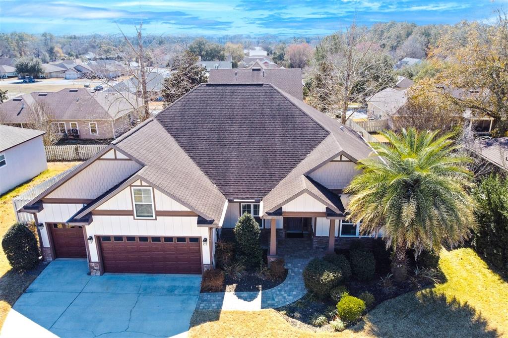 11949 Northwest 13 Road Gainesville, FL 32606 - Photo 14 of 46 a view of a house with a swimming pool