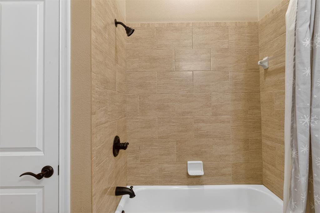 11949 Northwest 13 Road Gainesville, FL 32606 - Photo 35 of 46 a bathroom with a shower