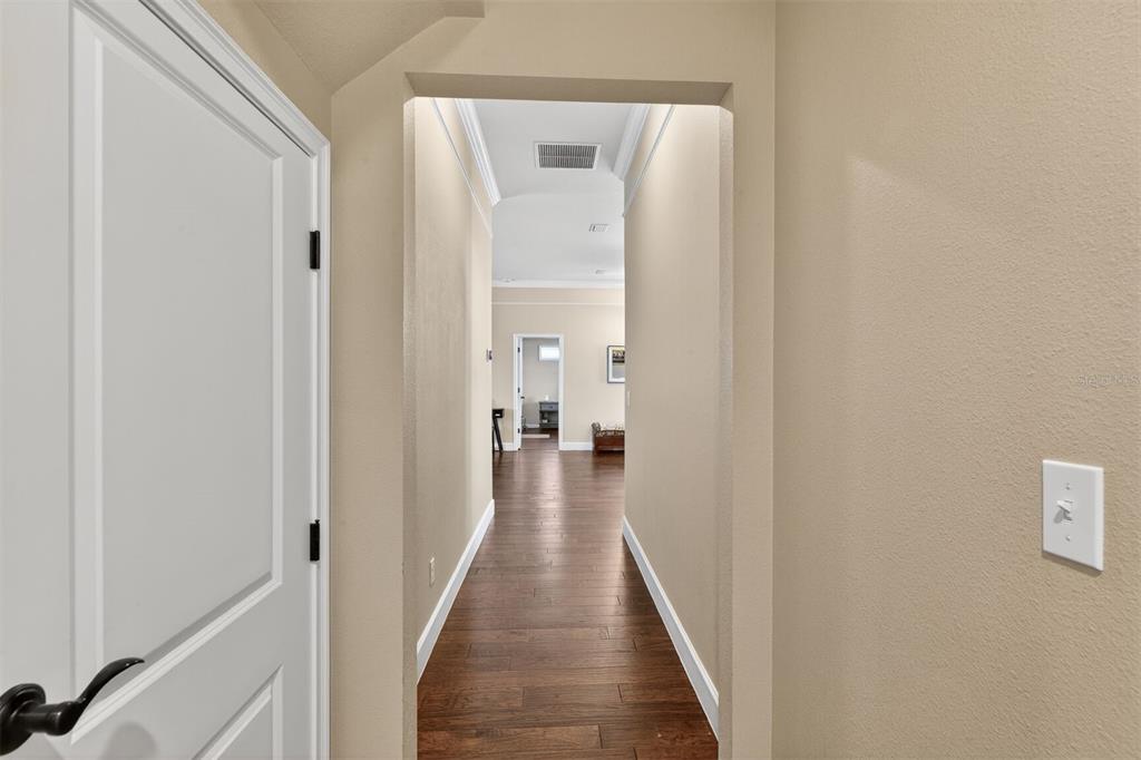 11949 Northwest 13 Road Gainesville, FL 32606 - Photo 38 of 46 a view of a hallway with wooden floor