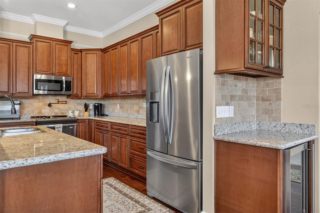 11949 Northwest 13 Road Gainesville, FL 32606 - Photo 46 of 46 a kitchen with stainless steel appliances granite countertop a refrigerator stove a sink and dishwasher