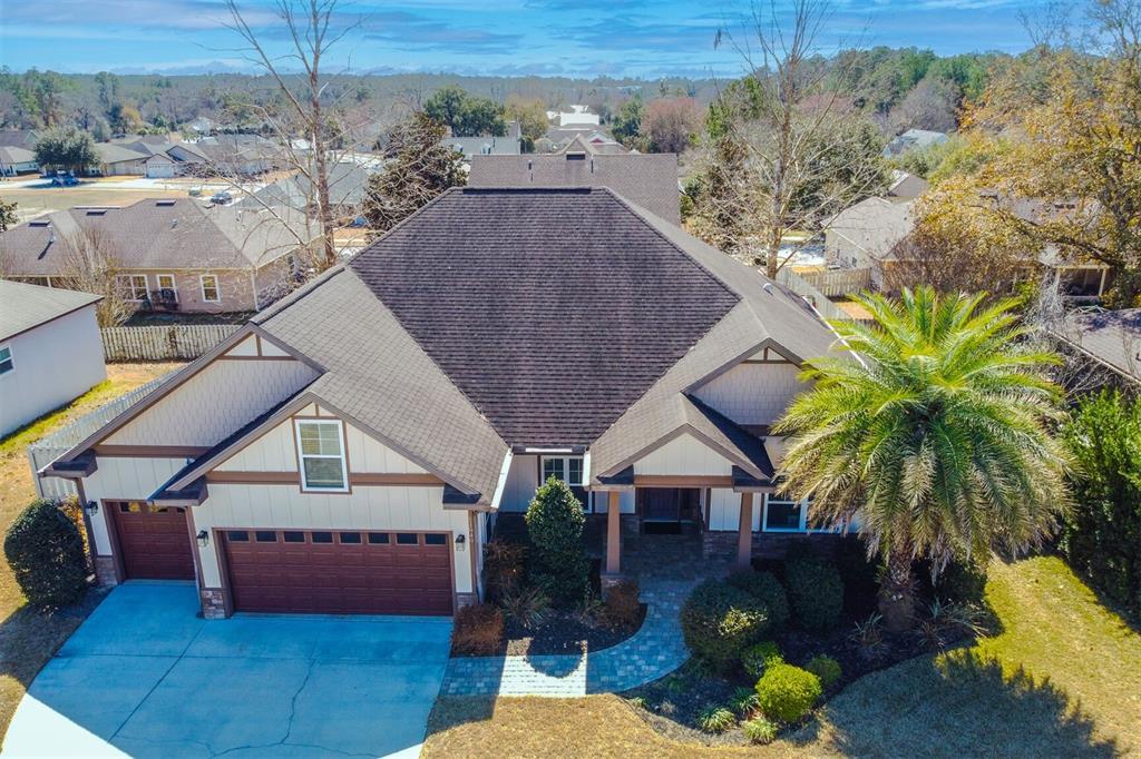 11949 Northwest 13 Road Gainesville, FL 32606 - Photo 10 of 46 an aerial view of a house with swimming pool and porch