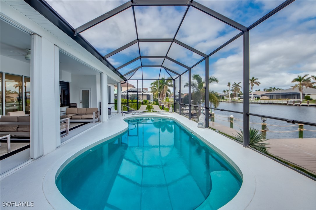 2703 Southwest 43rd Terrace Cape Coral, FL 33914 - Photo 39 of 50 a view of a living room and a wooden floor